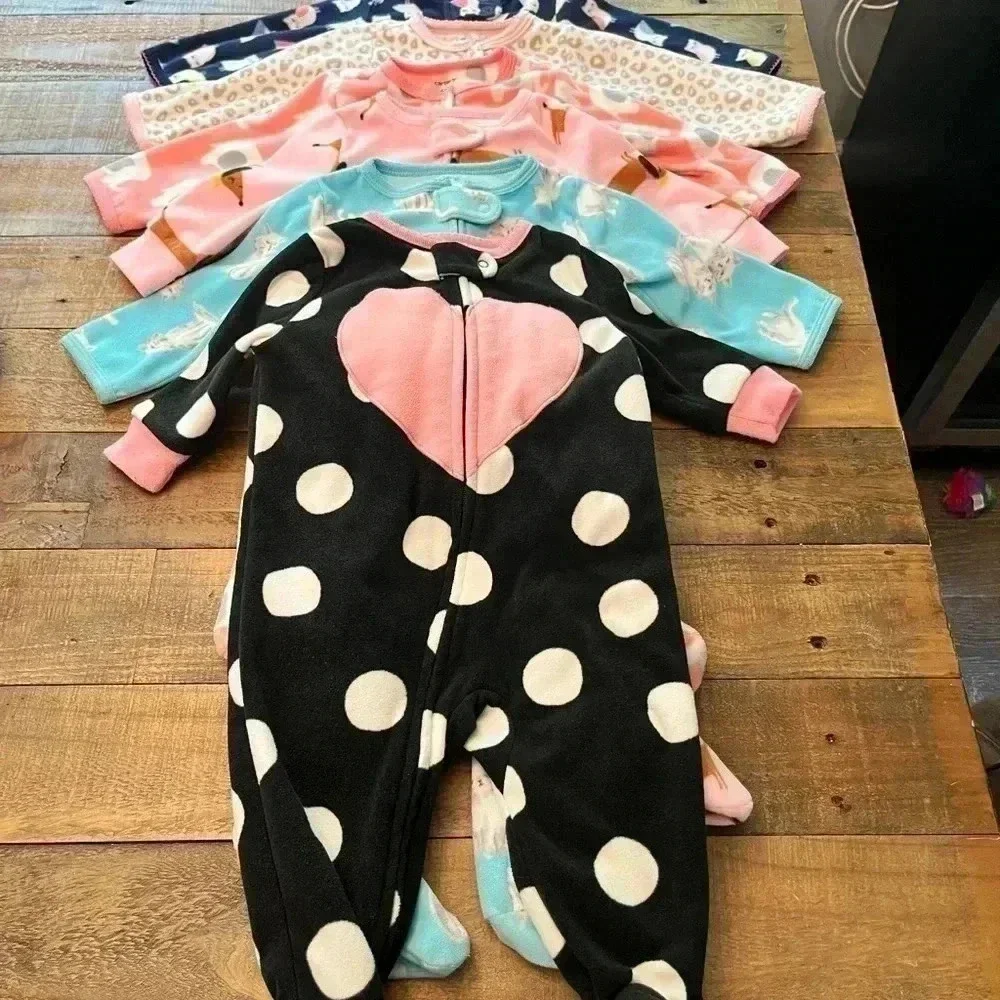 Six Carter’s Fleece Footie Pajamas